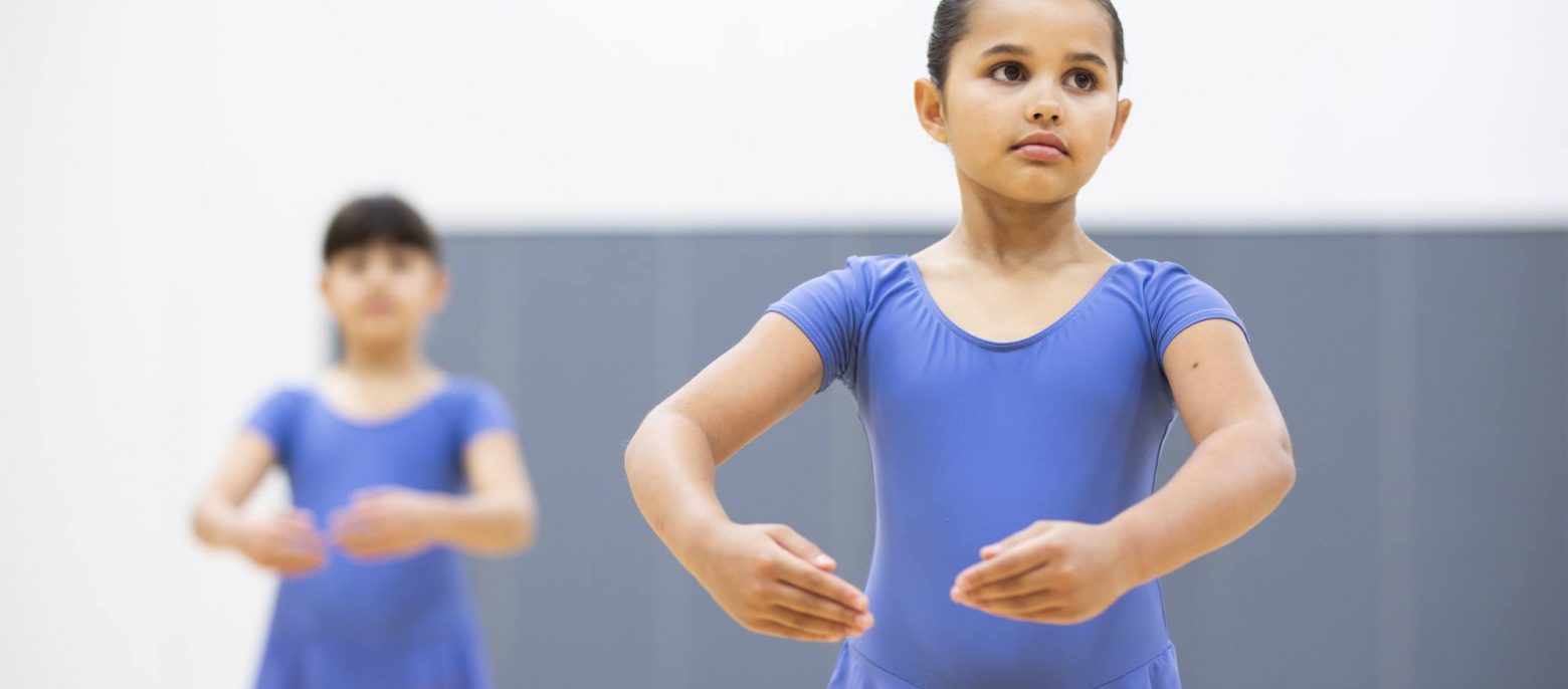 school girls having a ballet lesson