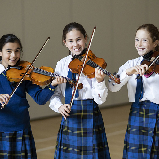 3 girls with violins