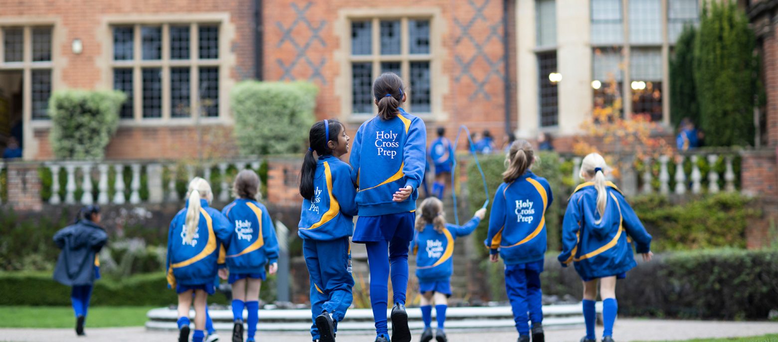 girls walking across the school grounds