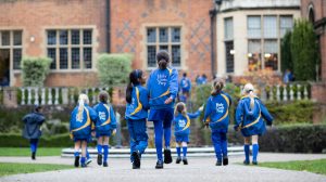 girls walking across the school grounds