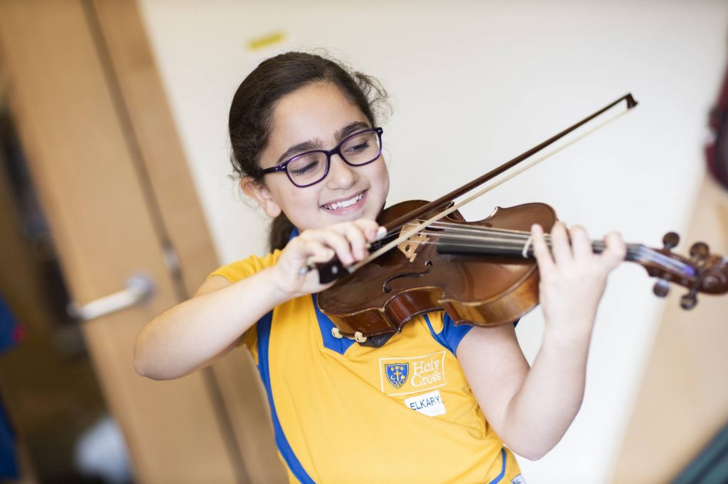 student playing the violin