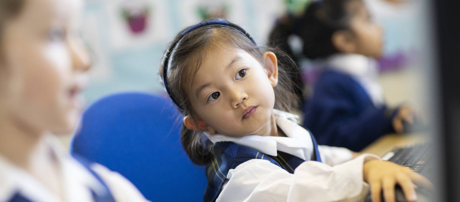 young student on a computer