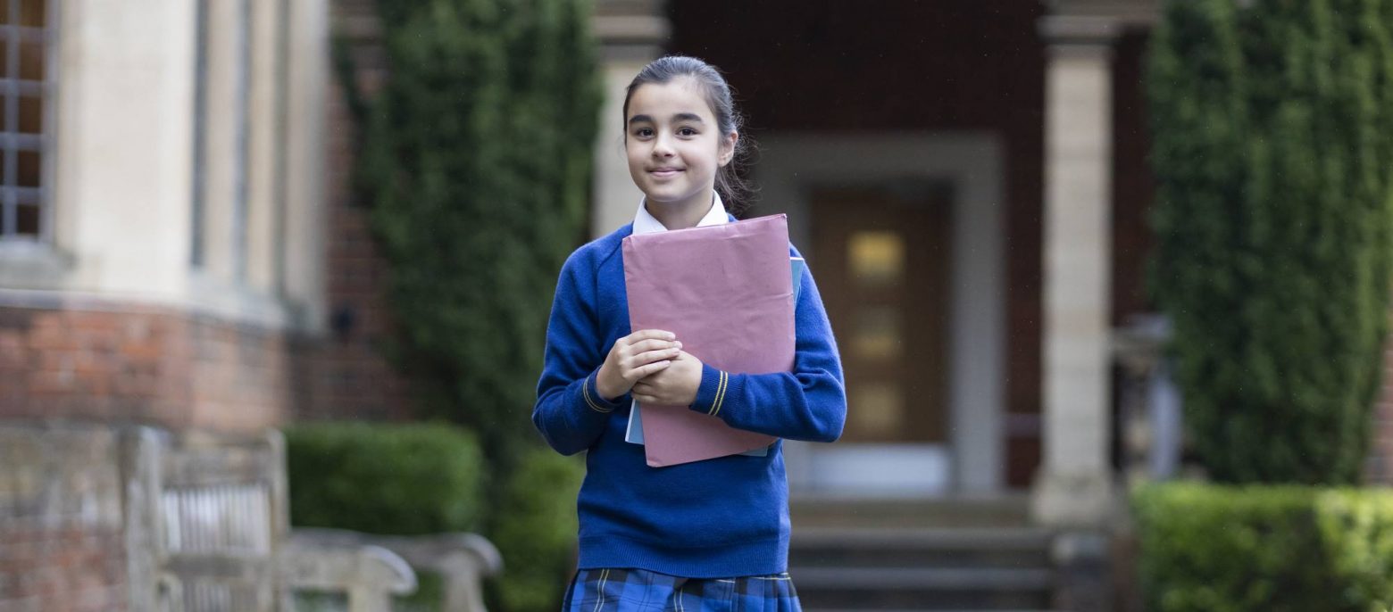 girl holding a folder