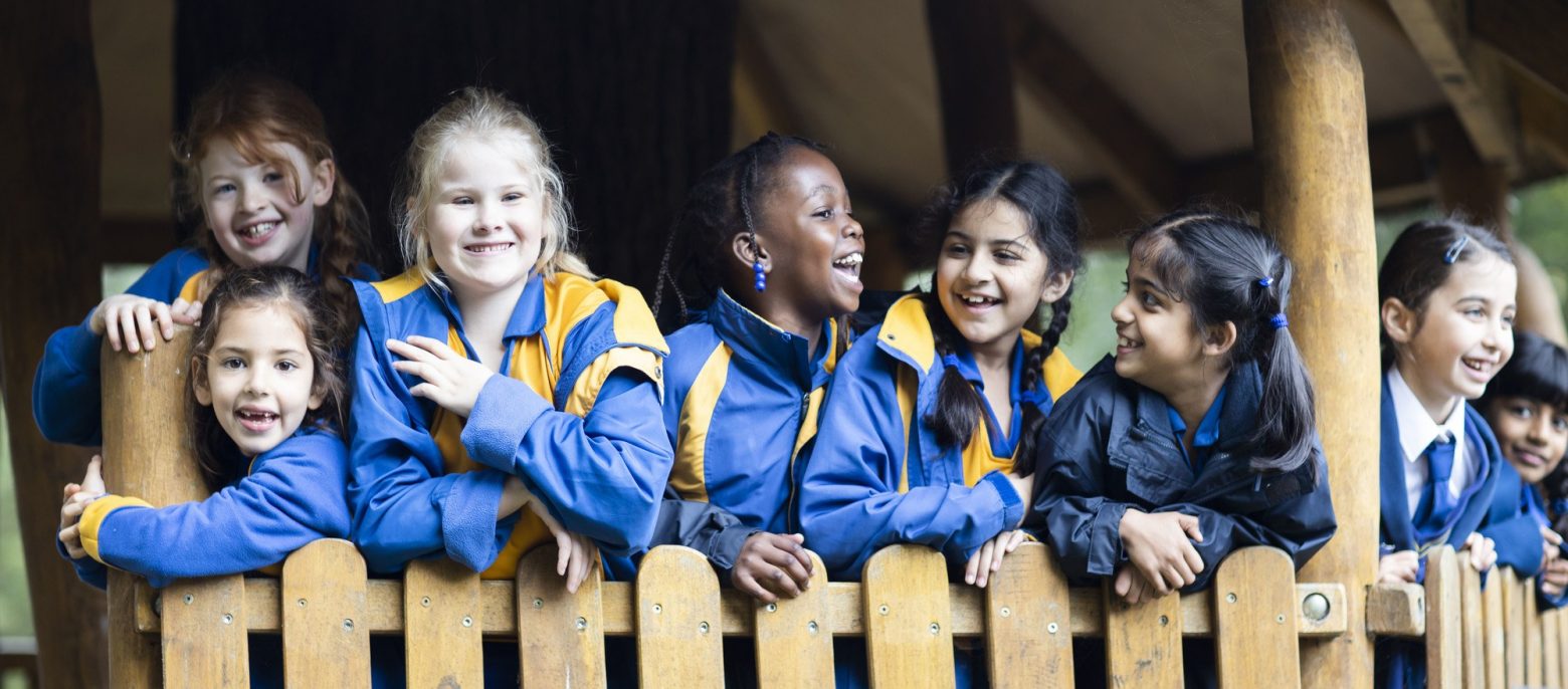 students outdoors in their coats