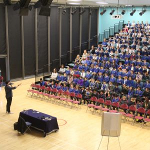 students in a performing hall