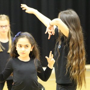 three girls dancing