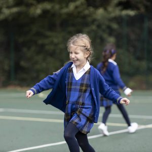 girl in Holy Cross Prep uniform