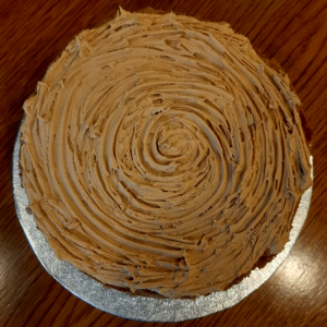 Coffee cake with the brown icing on the top