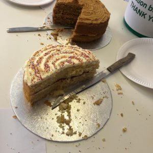 2 cakes being cut up