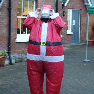 a teacher dressed as Santa