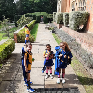 4 students with their sports kit