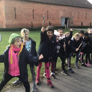 children holding axes