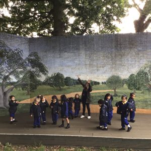 girls on an outdoor stage