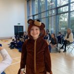 a child dressed as a bear